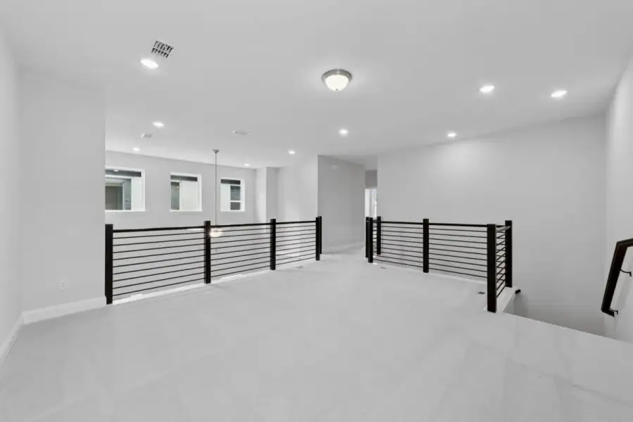Representative unfurnished interior of a home built from the Maisie by Landon Homes in Lexington Frisco, Frisco (Image 14).