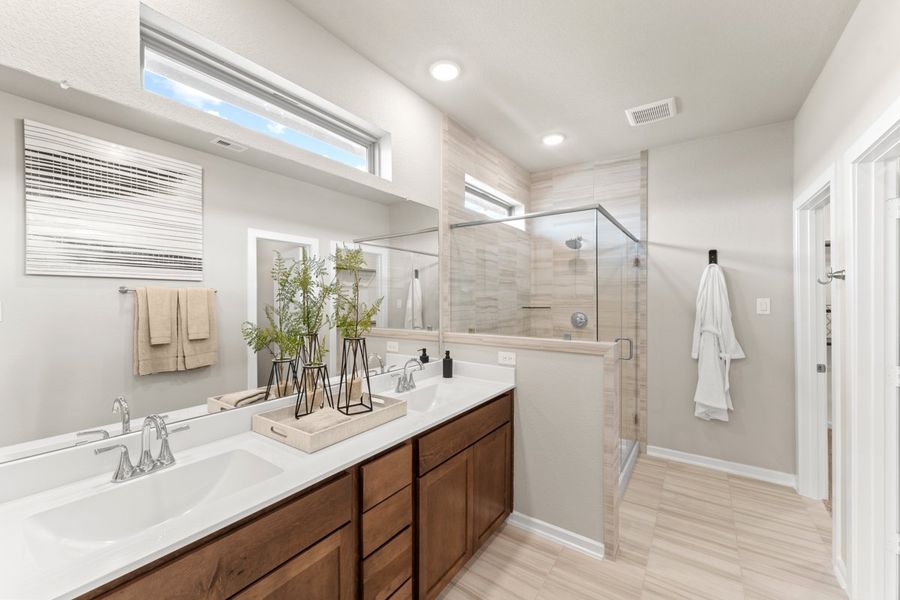 Representative furnished interior of a home built from the Capeside – Courtyard Collection by Chesmar Homes in Jordan Ranch, Pattison (Image 10).