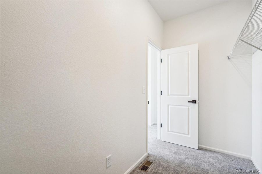 Spacious, unfurnished interior of a new home in Legato, Commerce City (Image 29).