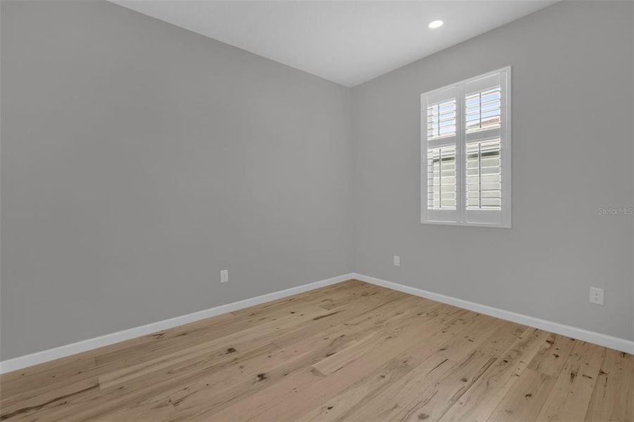 Spacious, unfurnished interior of a new home in Seasons at Lakeside Forest, Tavares (Image 41).