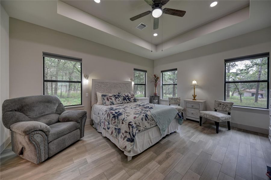 Relax in the Spacious Primary Bedroom, 1st Floor Relax in the Spacious Primary Bedroom, 1st Floor