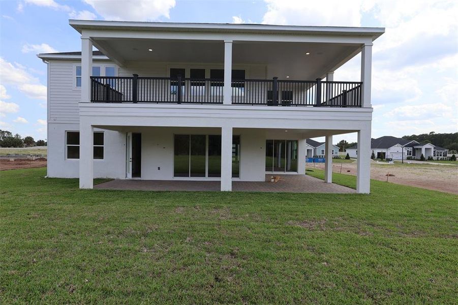 Exterior details and patio area of a home in Solace at Corner Lake, Orlando (Image 4). Exterior details and patio area of a home in Solace at Corner Lake, Orlando (Image 4).
