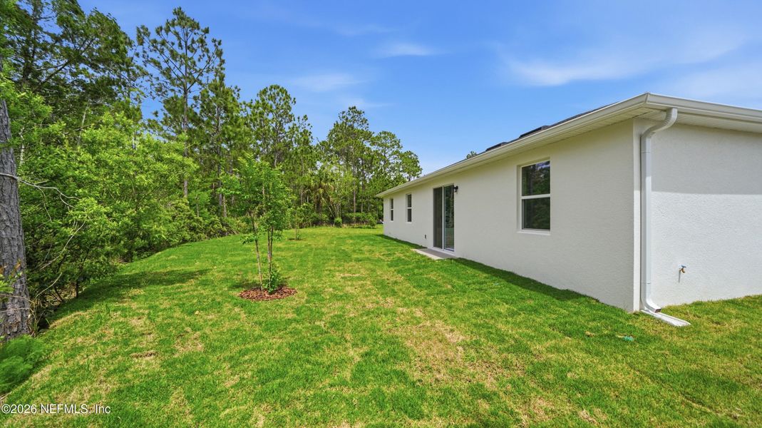 Exterior details and patio area of a home in Palm Coast, Palm Coast (Image 4).