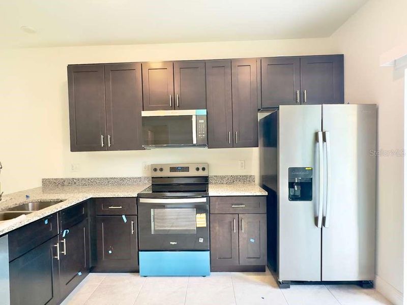 Furnished interior view inside a new home in , Ocala (Image 7).