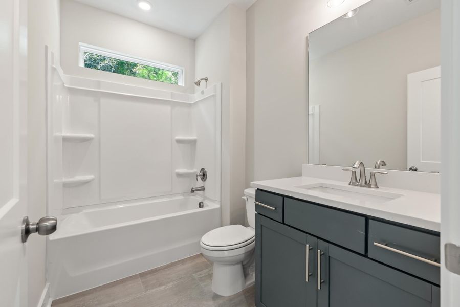 Furnished interior view inside a new home in Academy Park, Beaufort (Image 10).