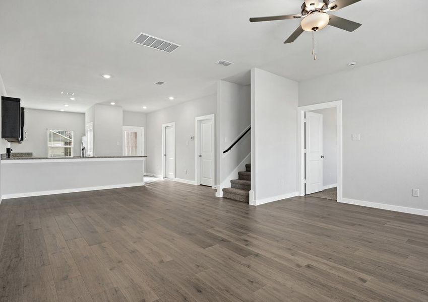 The Cottonwood has an open layout that connects the kitchen, dining room, and family room.