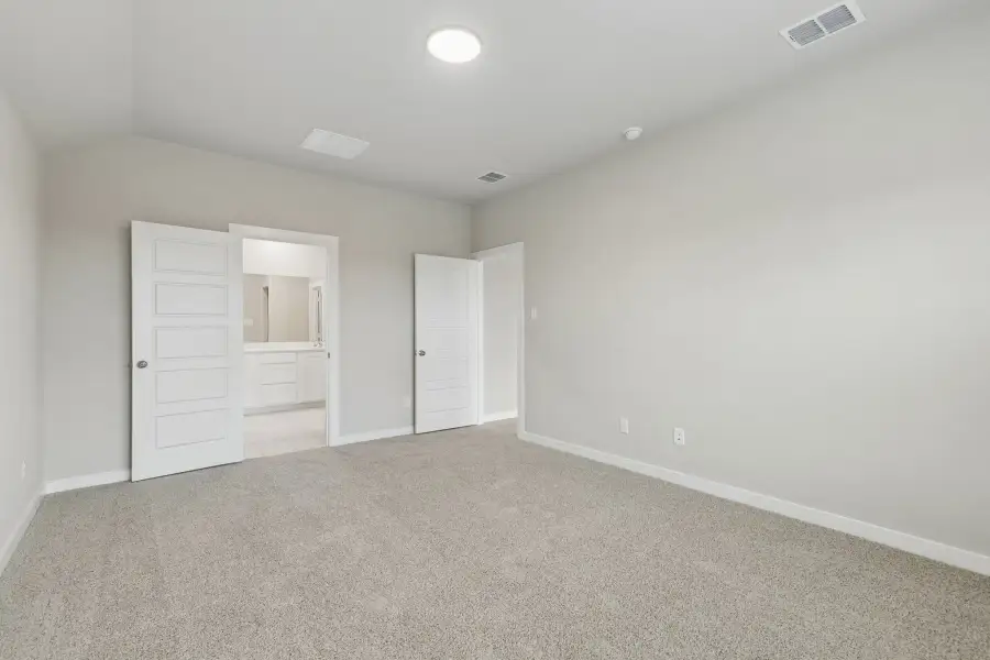 Primary Suite in the Emmy II home plan by Trophy Signature Homes - REPRESENTATIVE PHOTO
