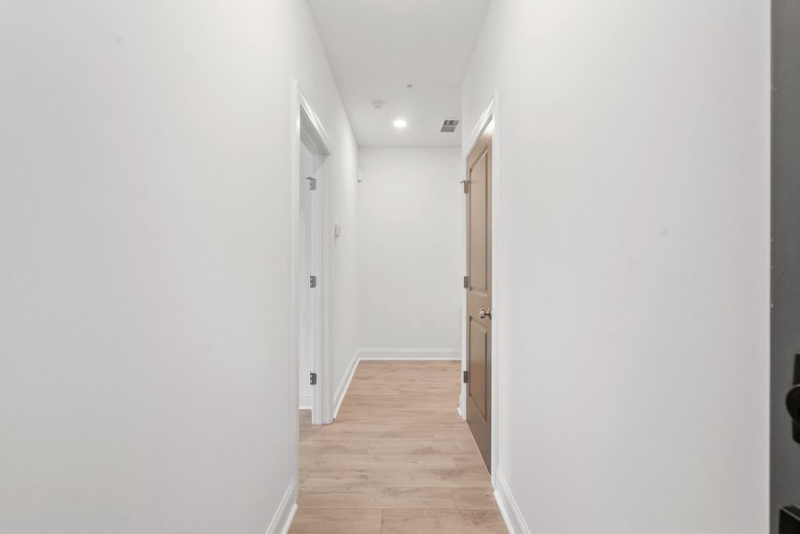 Representative unfurnished interior of a home built from the The Oleander by The Providence Group in Market Square at Sawnee Village, Cumming (Image 20).