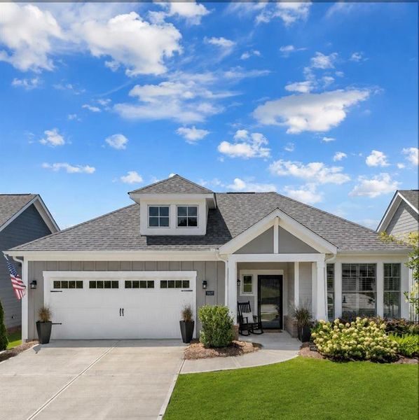 Front exterior of a new home in The Courtyards at Bailey Farms, Dacula, GA, highlighting curb appeal (Image 2). Front exterior of a new home in The Courtyards at Bailey Farms, Dacula, GA, highlighting curb appeal (Image 2).