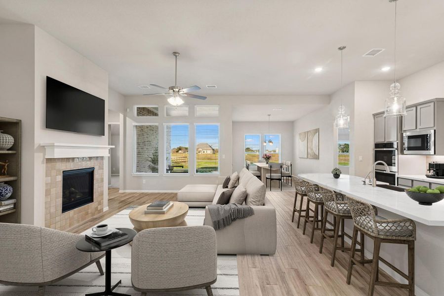 Open great room with fireplace (*Photo not of actual home and used for illustration purposes only.) Open great room with fireplace (*Photo not of actual home and used for illustration purposes only.)