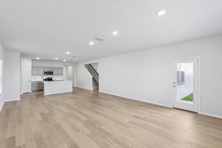 Living Room in the Holden home plan by Trophy Signature Homes – REPRESENTATIVE PHOTO Living Room in the Holden home plan by Trophy Signature Homes – REPRESENTATIVE PHOTO