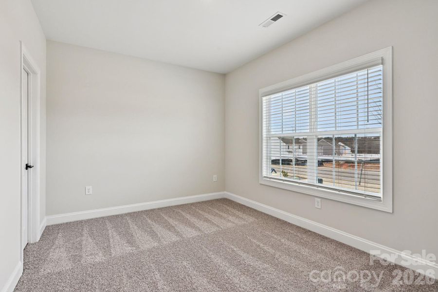 Spacious, unfurnished interior of a new home in Colonial Crossing, Troutman (Image 15).