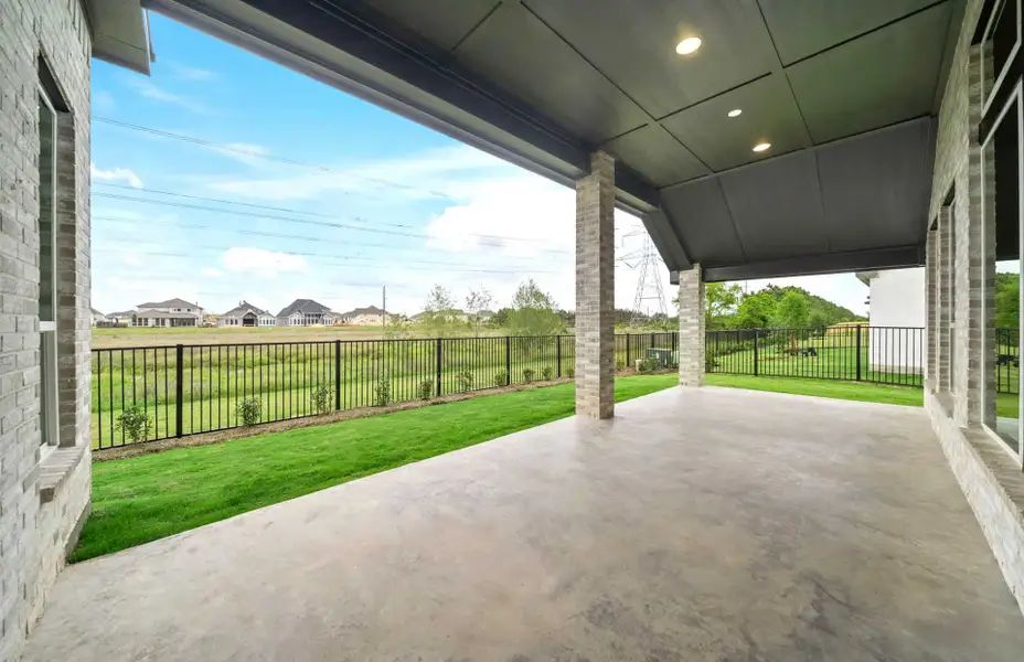 Exterior details and patio area of a home in Bridgeland 60′, Cypress (Image 3).
