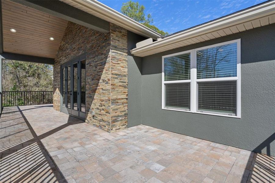 Exterior details and patio area of a home in , Webster (Image 32).