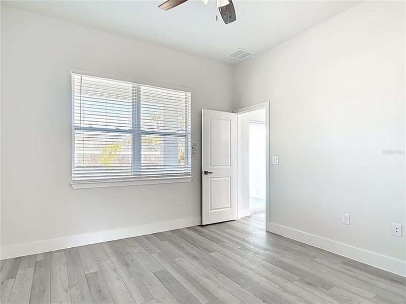 Spacious, unfurnished interior of a new home in , Port Charlotte (Image 30).