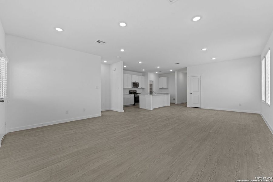 Spacious, unfurnished interior of a new home in Waterwheel: Coastline Collection, San Antonio (Image 10).