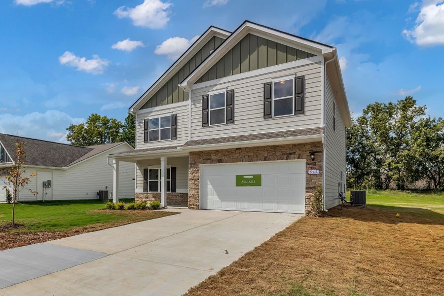 Front exterior of a new home in Hampshire Hills, Columbia, TN, highlighting curb appeal (Image 2). Front exterior of a new home in Hampshire Hills, Columbia, TN, highlighting curb appeal (Image 2).