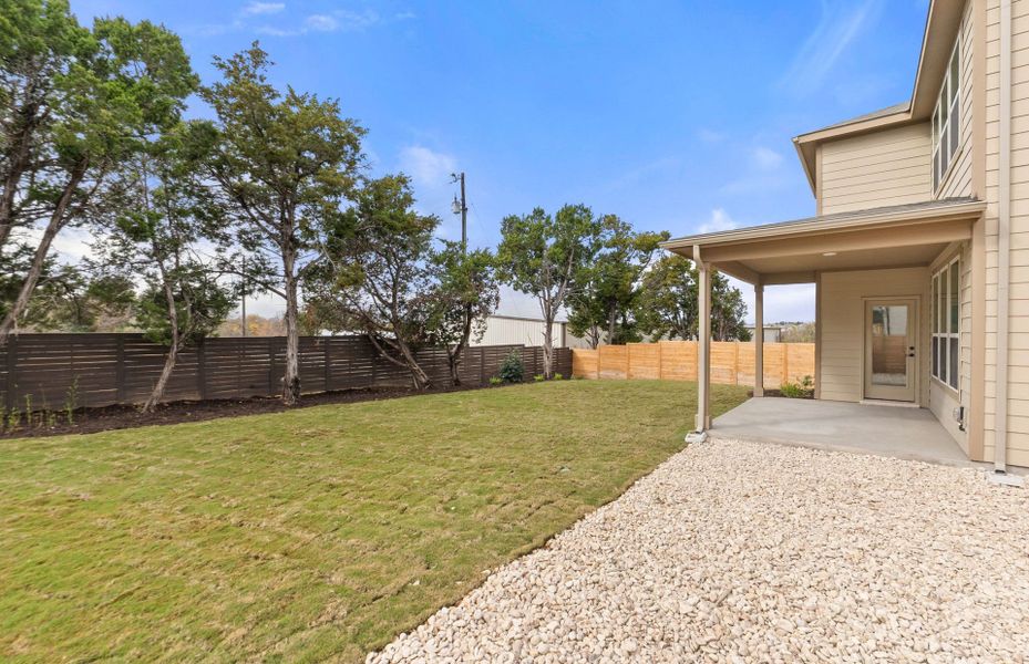 Exterior details and patio area of a home in Horizon Lake, Leander (Image 23).