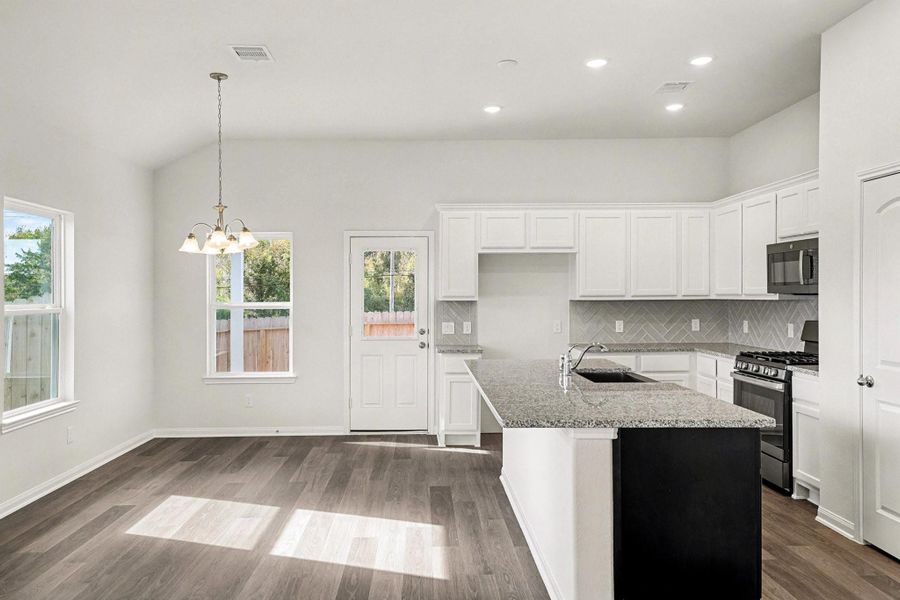 Furnished interior view inside a new home in Clear View Estates, Willis (Image 5).