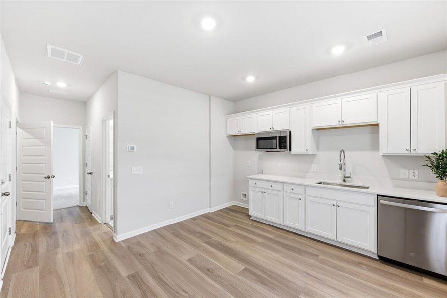 Furnished interior view inside a new home in Limehouse Village: Arbor Series, Summerville (Image 46).