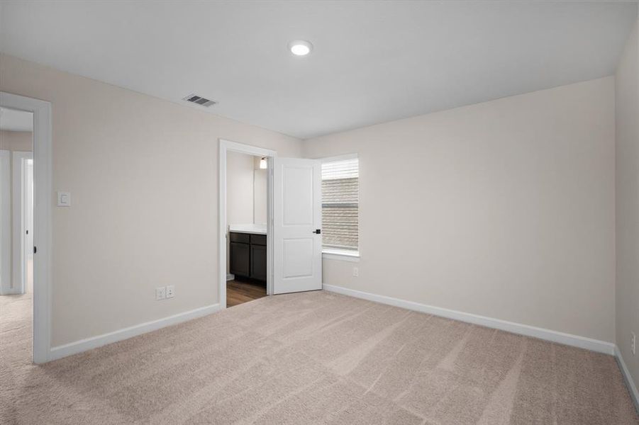 One of the three sizeable upstairs bedrooms.