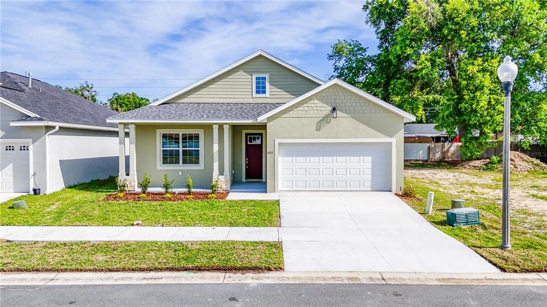 Front exterior of a new home in , Ocala, FL, highlighting curb appeal (Image 18).