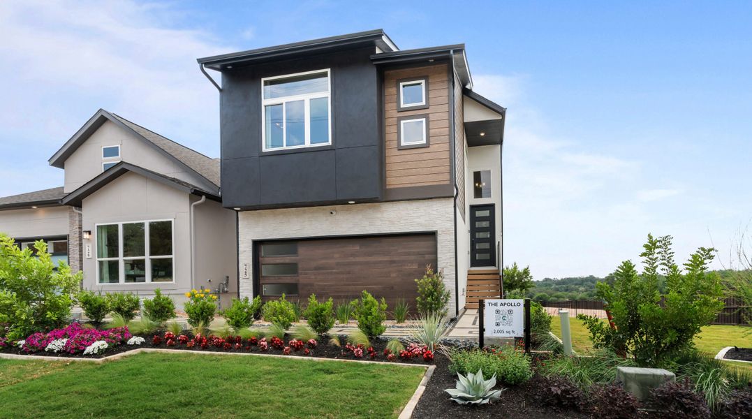 Front exterior of a new home in Centero at Stone Oak, San Antonio, TX, highlighting curb appeal (Image 23).