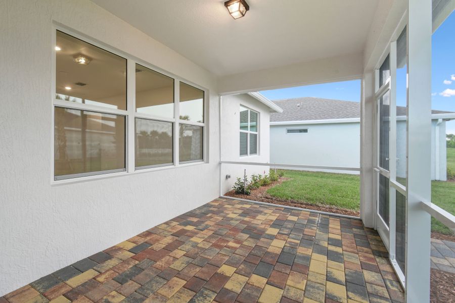 Exterior details and patio area of a home in Del Webb Tradition, Port St. Lucie (Image 4).