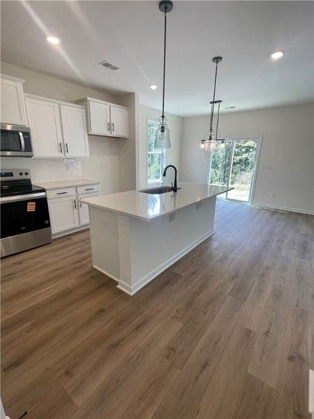 Furnished interior view inside a new home in Springwood Grove, Central (Image 9).
