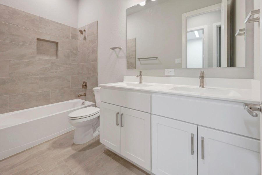 Furnished interior view inside a new home in Grand Central Park 55' Homesites, Conroe (Image 4). Furnished interior view inside a new home in Grand Central Park 55' Homesites, Conroe (Image 4).