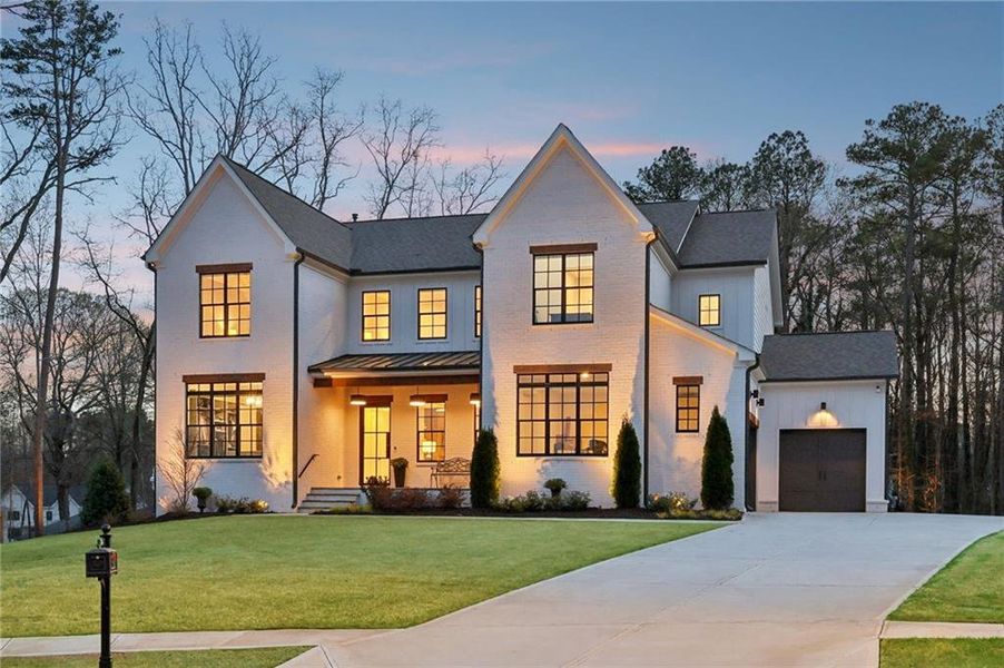 Front exterior of a new home in , Roswell, GA, highlighting curb appeal (Image 2). Front exterior of a new home in , Roswell, GA, highlighting curb appeal (Image 2).