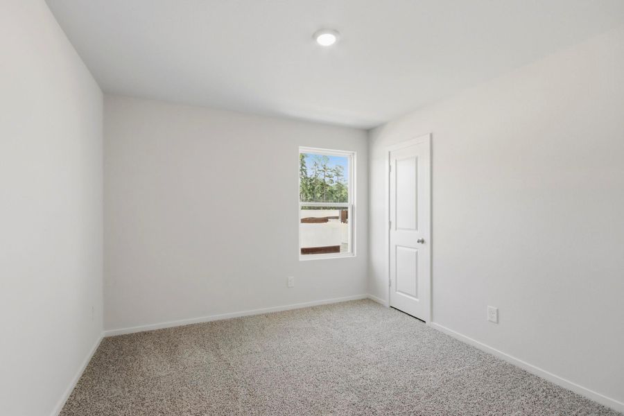 Spacious, unfurnished interior of a new home in The Canopies, Splendora (Image 14).