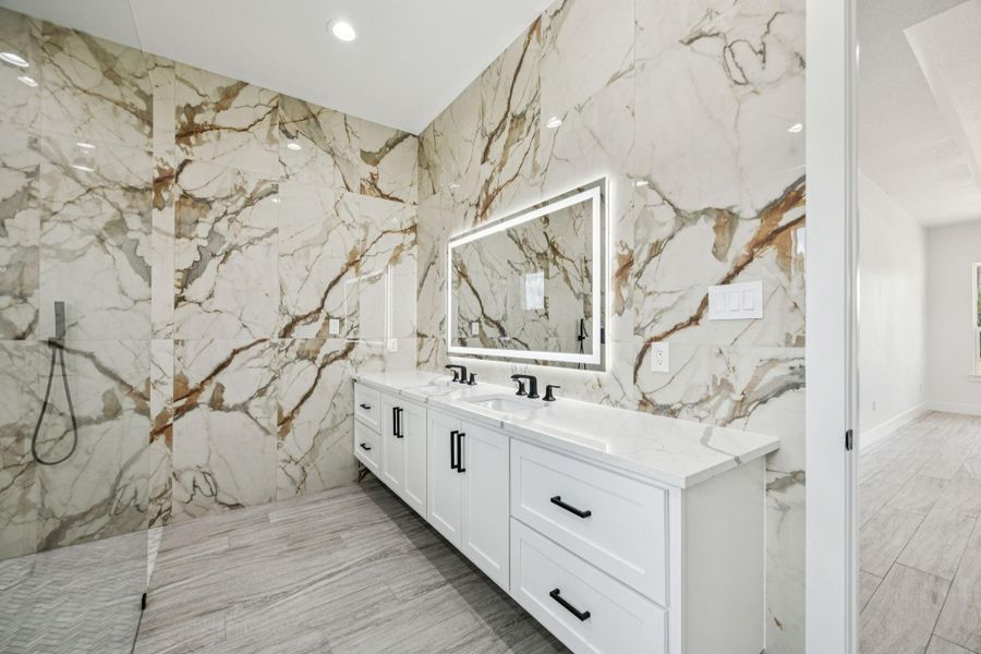 Primary bathroom has 2 sinks for added convenience and additional cabinet storage! Primary bathroom has 2 sinks for added convenience and additional cabinet storage!