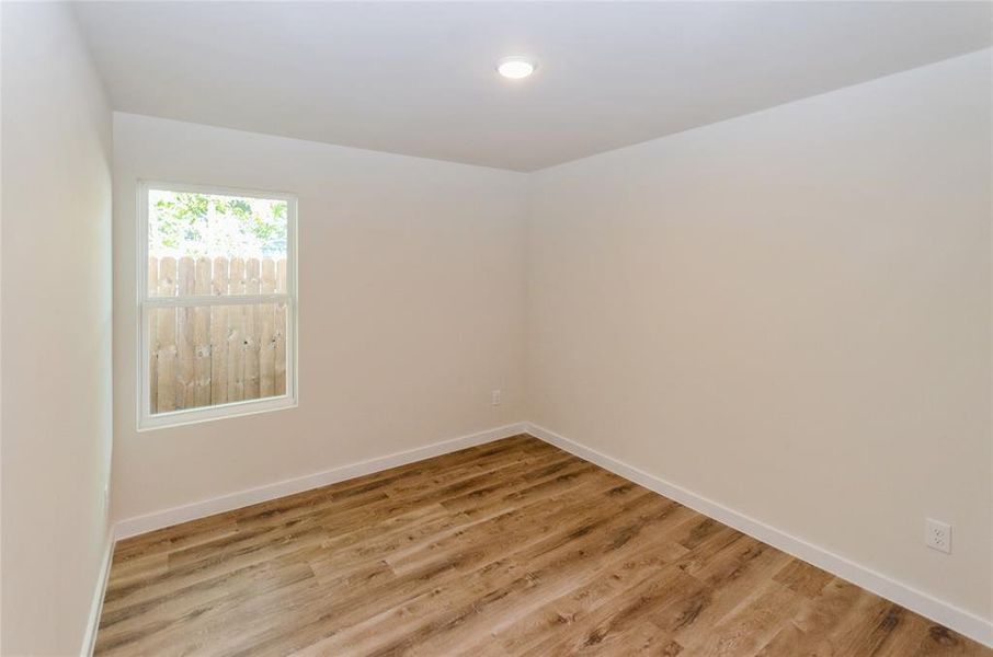 Spare room featuring light hardwood / wood-style floors