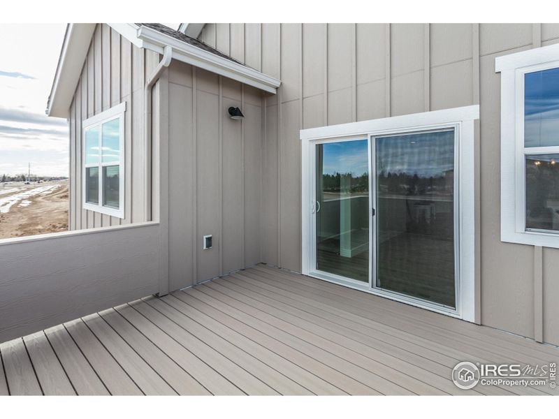 Exterior details and patio area of a home in Wilson Commons, Loveland (Image 3).