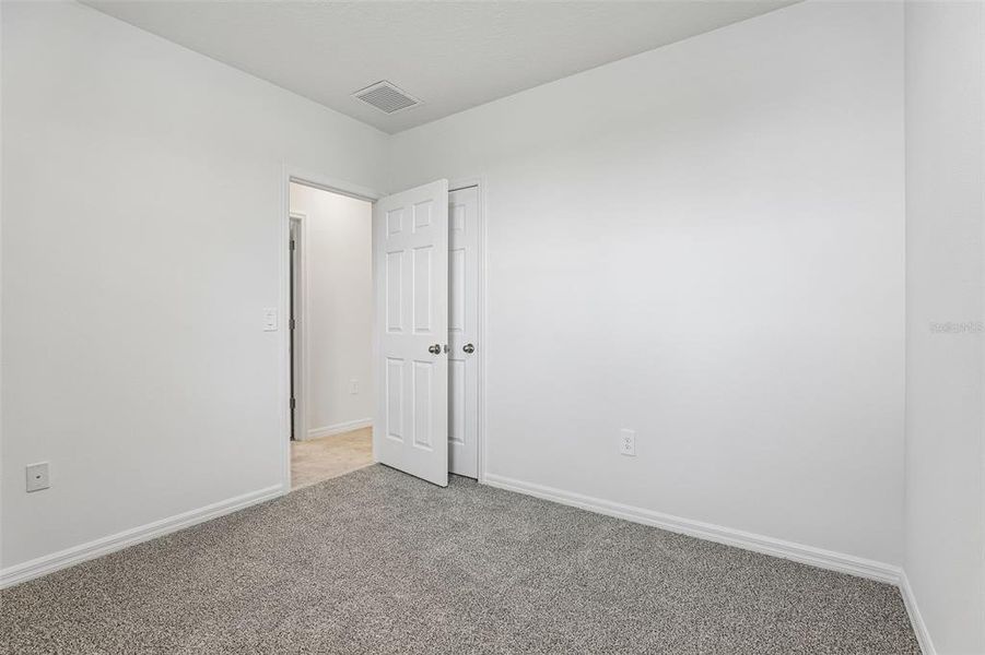Spacious, unfurnished interior of a new home in Bradbury Creek - Classic Series, Haines City (Image 19). Spacious, unfurnished interior of a new home in Bradbury Creek - Classic Series, Haines City (Image 19).