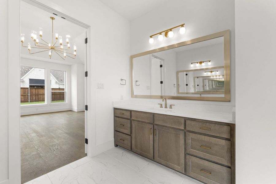 Representative furnished interior of a home built from the 7042 by Tradition Homes in Mustang Lakes, McKinney (Image 11).