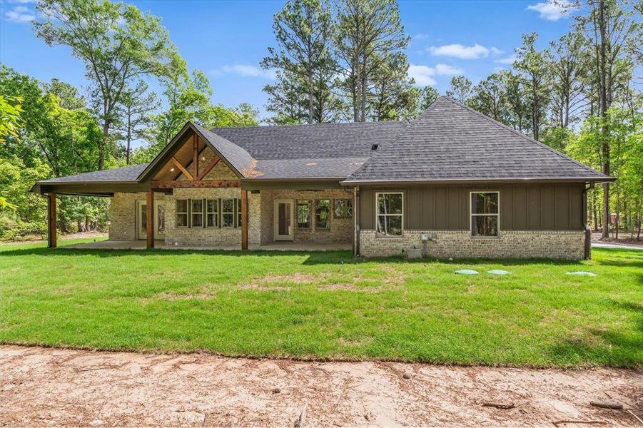 Exterior details and patio area of a home in , Grand Saline (Image 22).