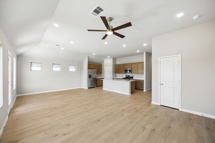 Dining and Living Area in the Sabine home plan by Trophy Signature Homes – REPRESENTATIVE PHOTO Dining and Living Area in the Sabine home plan by Trophy Signature Homes – REPRESENTATIVE PHOTO