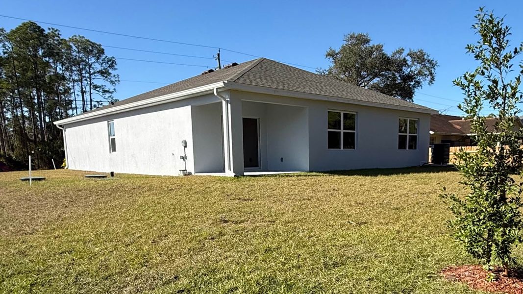 Exterior details and patio area of a home in Palm Bay, Palm Bay (Image 3).