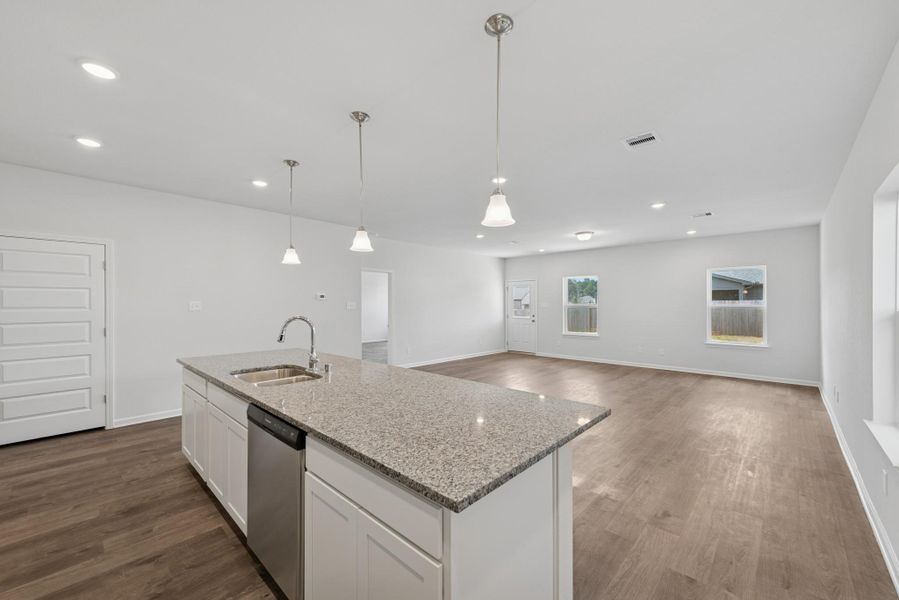 The Crawford- Kitchen into Family Room The Crawford- Kitchen into Family Room