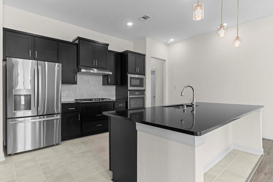 Gourmet kitchen comes with upgraded built-in stainless-steel appliances. Pot & pans draws and more! Gourmet kitchen comes with upgraded built-in stainless-steel appliances. Pot & pans draws and more!