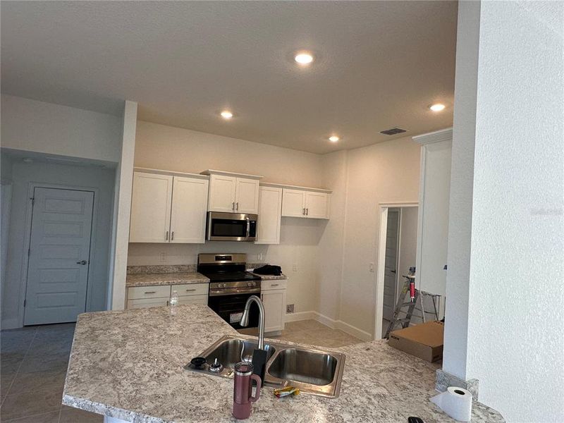 Furnished interior view inside a new home in , Ocala (Image 7).