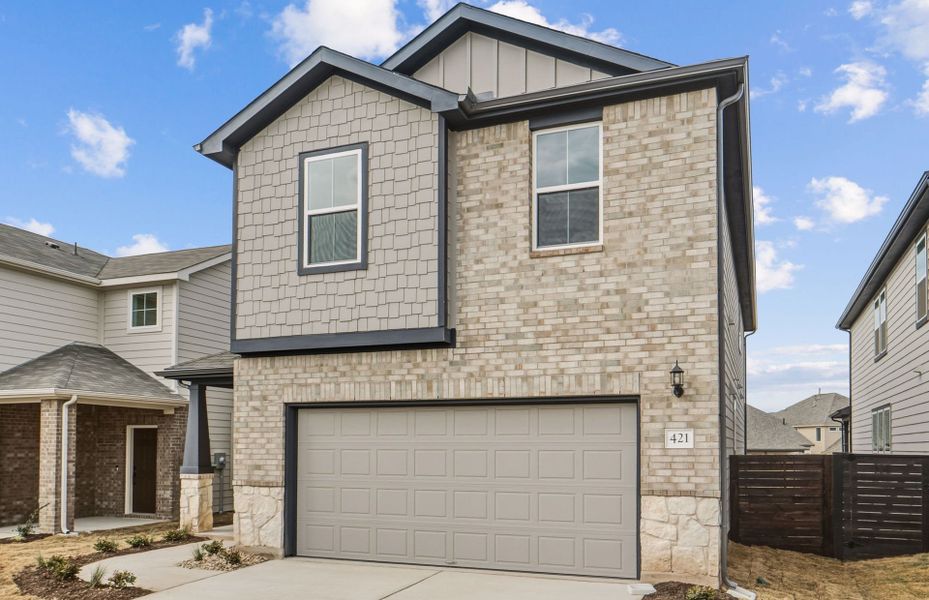 Front exterior of a new home in Horizon Lake, Leander, TX, highlighting curb appeal (Image 22).