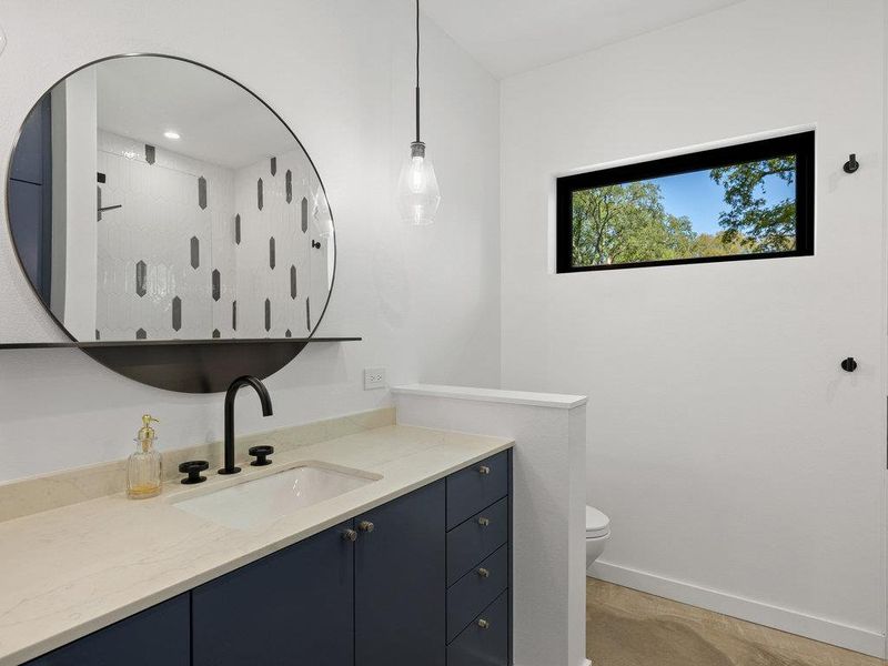 Full bathroom featuring vanity and a walk in shower