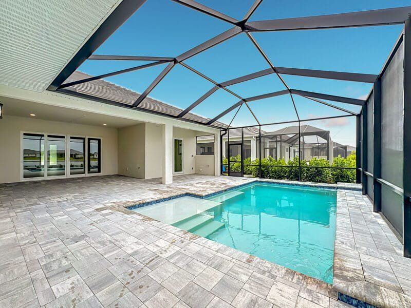 Exterior details and patio area of a home in River Preserve Estates, Parrish (Image 30).