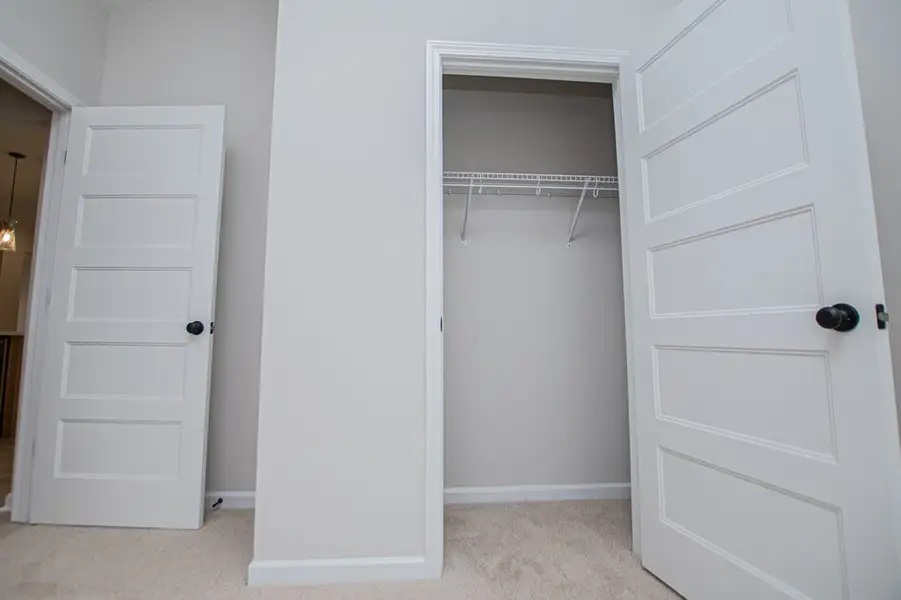Spacious, unfurnished interior of a new home in WOODMONT RESERVE, Roopville (Image 66).