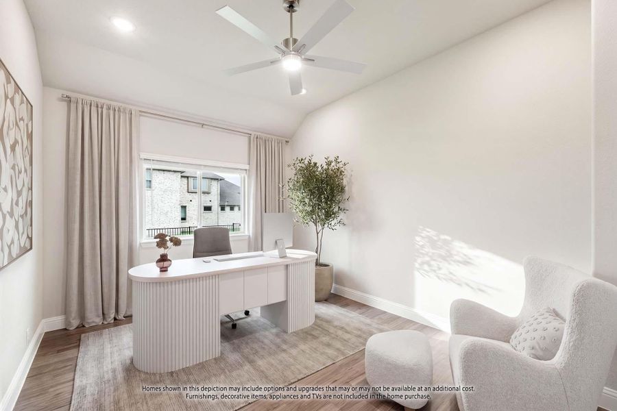 Home office with white oval desk, ceiling fan, vaulted ceiling, and hardwood floors