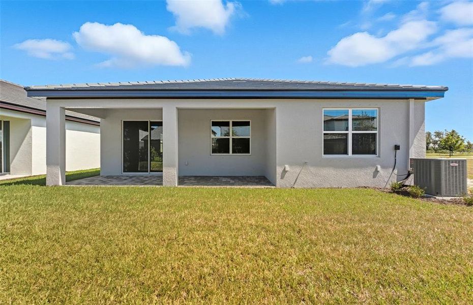 Exterior details and patio area of a home in Longmeadow at North River Ranch, Parrish (Image 3).