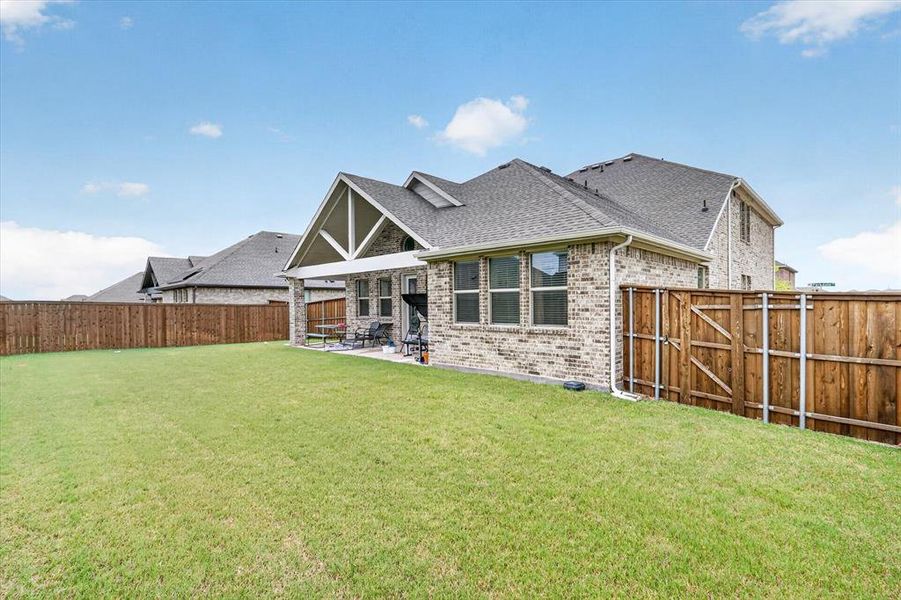 Exterior details and patio area of a home in Gateway Parks, Forney (Image 2). Exterior details and patio area of a home in Gateway Parks, Forney (Image 2).